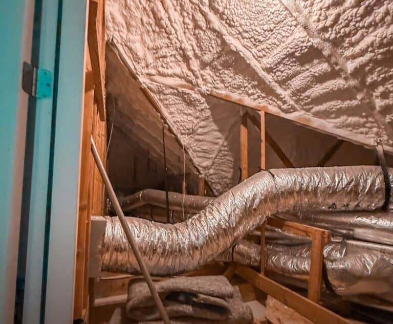 Attic with spray foam on the roof deck and flex ductwork
